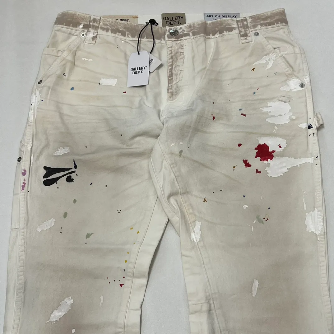 GALLERY DEPT. PAINTED CARPENTER FLARE graffiti logging pants, size 30/32/34/36, pure logging workwear style! Super heavy industry, mud dyeing and cleaning, worn out holes, all molded and customized, accessories are complete and correct! Artificial ink graffiti, tedious and heavy work